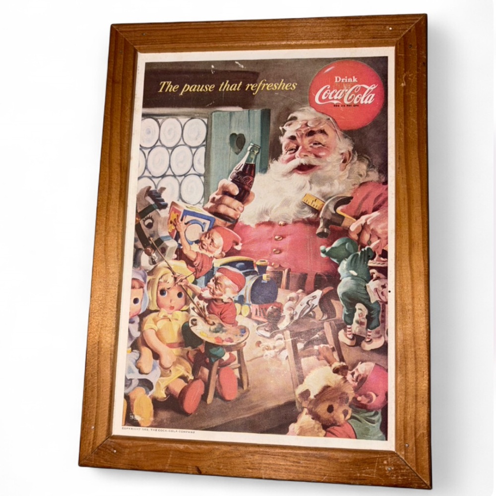 1953 Coca-Cola Holiday Santa Poster in a wooden frame